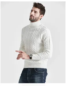 Detail view of men's white cable-knit turtleneck sweater showing texture and fit