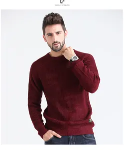 Detailed view of a men's burgundy ribbed crew neck sweater with a modern slim fit design