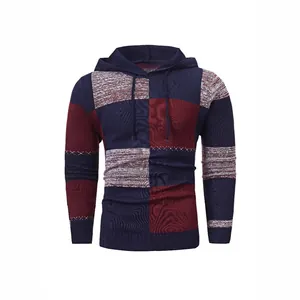 Detailed macro view of a men's color-block knitted hoodie in navy and burgundy