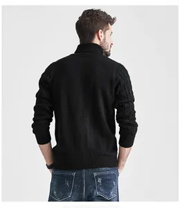 Back view of a slim fit black men's turtleneck sweater featuring cable knit sleeves