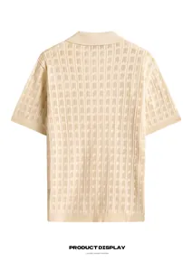 Back view of cream textured knit polo shirt highlighting vertical waffle pattern detail
