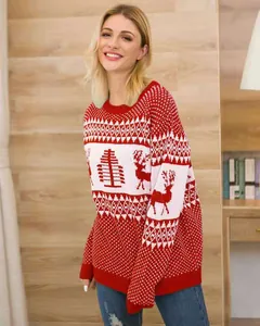 Detailed view of women's Christmas sweater featuring red reindeer and tree jacquard