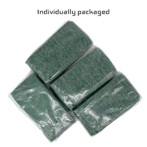 Macro detail showing four green knitted gun socks in individual plastic film packaging.