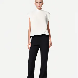 Elegant white high-neck sleeveless wool knit vest for women, professional studio model view.