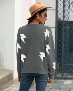 Back view of stylish gray long-sleeved knitted sweater featuring white lightning bolt patterns