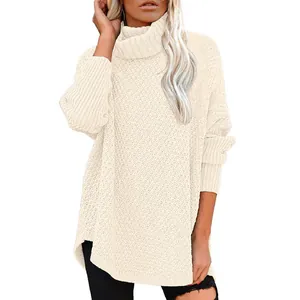 Detail of women's cream knit turtleneck sweater with chunky loose fit and textured pattern