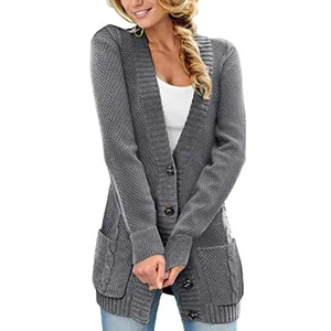 Detailed view of grey mid-length knit cardigan featuring buttons and textured pockets