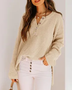 Detail view of cream button-up knit sweater with textured weave and casual loose fit