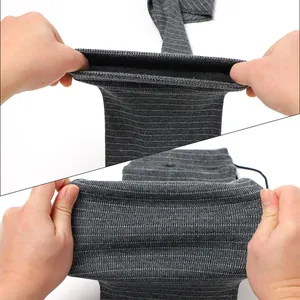 Close-up detail of stretchable silicone-treated gray knit gun sock showing fabric texture