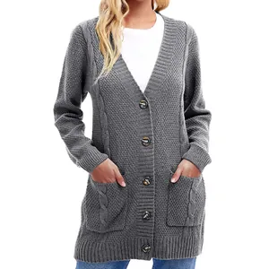Detail view of a gray mid-length cable knit cardigan sweater with pockets and buttons