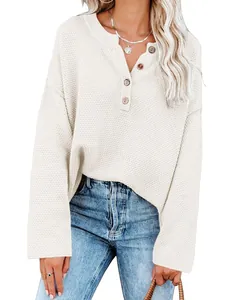 Detailed close-up view of women's beige waffle knit henley sweater with wooden buttons