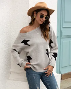 Stylish gray off-shoulder knit sweater featuring bold black lightning bolt patterns.
