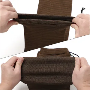 Close-up showing the elasticity and fine knit texture of the silicone-treated brown gun sock.