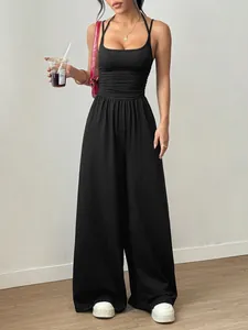 Summer black sleeveless wide-leg jumpsuit with ruched waist and casual sling design