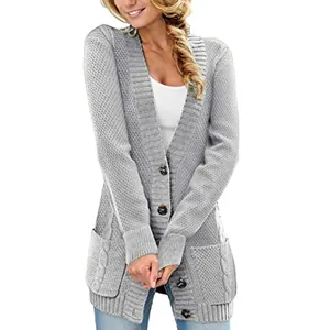 Women's mid-length grey waffle knit cardigan sweater with buttons and side pockets.