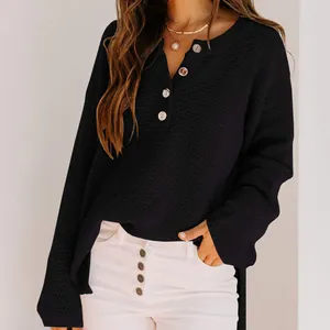 Women's loose black knit sweater with a button-up Henley collar for casual autumn style