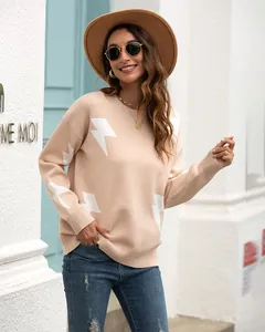 Casual women's beige knit sweater with white lightning bolt pattern shown on a model