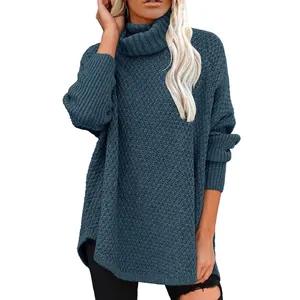 Womens oversized blue turtleneck sweater with chunky knit texture for winter fashion look