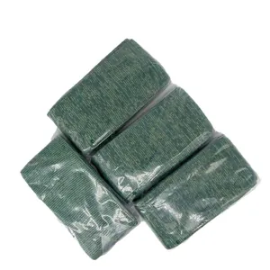 Four green knitted gun socks protective sleeves for rust and moisture prevention