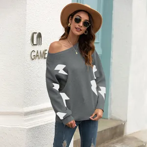 Stylish grey long sleeve knitted sweater with white lightning bolt patterns