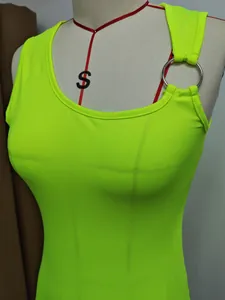 Detail view of neon green sleeveless dress with asymmetrical ring neckline