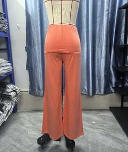 Detailed rear view of peach high-waisted wide-leg yoga pants displayed on a mannequin