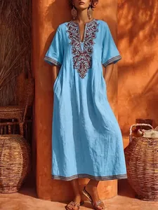 Bohemian light blue maxi dress with retro floral print embroidery and elegant V-neck design