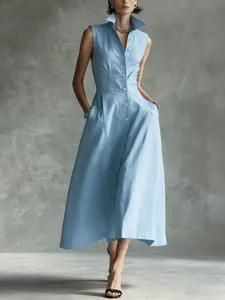 Elegant light blue sleeveless dress featuring a stand collar and front button closure.