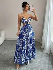 Elegant full length view of blue and white floral print cutout maxi dress for summer vacation