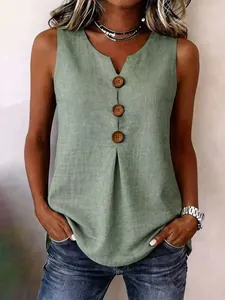 Detail of women's sleeveless cotton linen top in sage green with wooden buttons