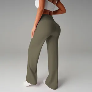 Back view of high-waisted olive green wide-leg yoga pants for women outdoors