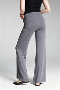 Back view detail of comfortable gray wide-leg flare yoga pants in soft stretch fabric