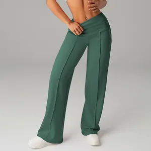 Dark green high waisted wide leg yoga pants for women featuring a fold-over waistband