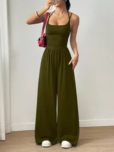 Detailed view of a chic olive green halter jumpsuit with a stylish wide-leg design.