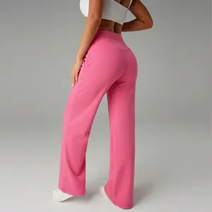 Back view of high-waisted pink wide-leg sports trousers showing comfortable fit for women