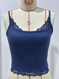 Detailed shot of a navy blue slim-fit camisole with delicate lace trim on the edges