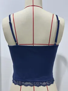Close-up of navy blue lace trim camisole back on mannequin