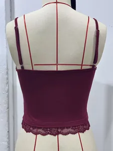 Back view of a burgundy slim-fit cropped camisole with delicate lace trim on a mannequin.