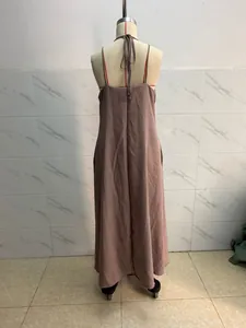 Back view of elegant dusty rose sleeveless slip maxi dress with adjustable tie detail