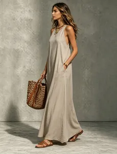 Elegant women's sleeveless halter maxi dress in beige with side pockets for summer wear
