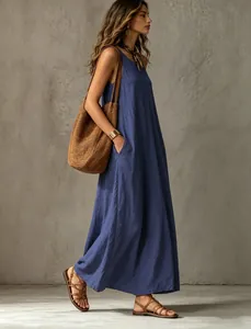 Elegant women's sleeveless maxi dress in blue with a relaxed fit and natural texture.