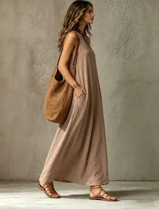 Side view of a sleeveless khaki maxi dress with relaxed fit and elegant draping