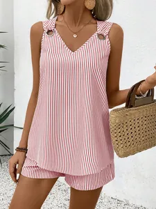 Detail of striped V-neck sleeveless top and shorts set with silver ring shoulder straps