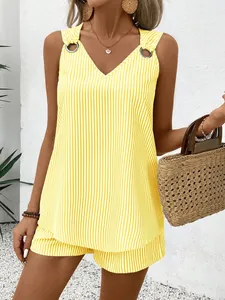 Detailed view of women's yellow striped sleeveless V-neck tank top and shorts set