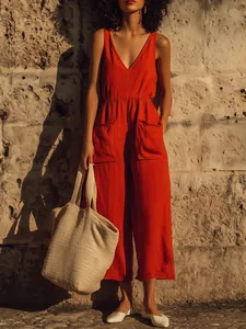 Red sleeveless V-neck cotton linen jumpsuit with wide-leg pockets for summer