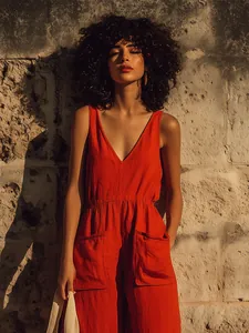 Chic orange cotton linen V-neck sleeveless jumpsuit with large pockets for summer