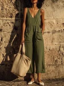 Detailed view of olive green cotton linen sleeveless jumpsuit with wide-leg design