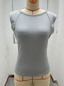 Close-up of grey ribbed knit sleeveless top showing texture and slim fit
