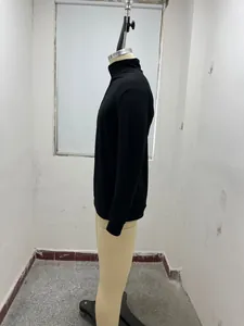 Side view of a black men's long-sleeve zip-up polo shirt on a mannequin