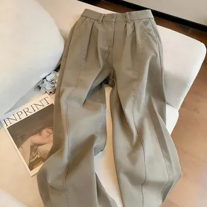 High-waisted wide-leg trousers with a draped, loose fit in a stylish khaki shade.
